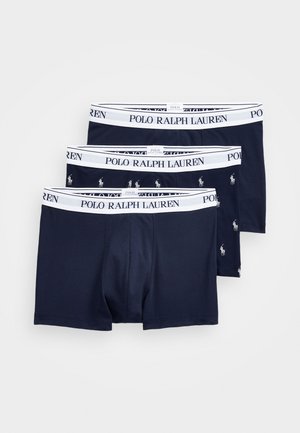 Trois paires de boxeurs navy avec ceintures élastiques présentant le logo "POLO RALPH LAUREN" ; une paire a un motif de petit joueur de polo.