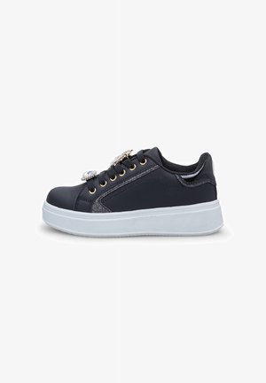 Black sporty sneakers with a smooth faux leather upper, featuring gold eyelets, glitter accents, and a white rubber sole.