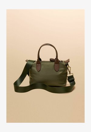 Green nylon handbag with brown leather accents, dual top handles, and a detachable shoulder strap. Smooth texture, rectangular shape.