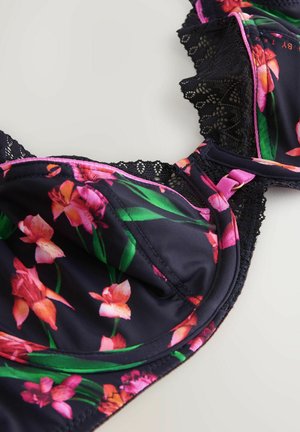 Schwarzer BH mit floralen Mustern in lila und pinken Orchideen, Spitzenbesatz, verstellbaren Trägern und Unterbruststütze für eine formende Wirkung.