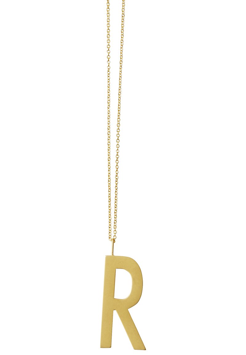 Pendentif en or en forme de grande lettre "R" majuscule, avec une finition lisse et mate, suspendu à une chaîne délicate.