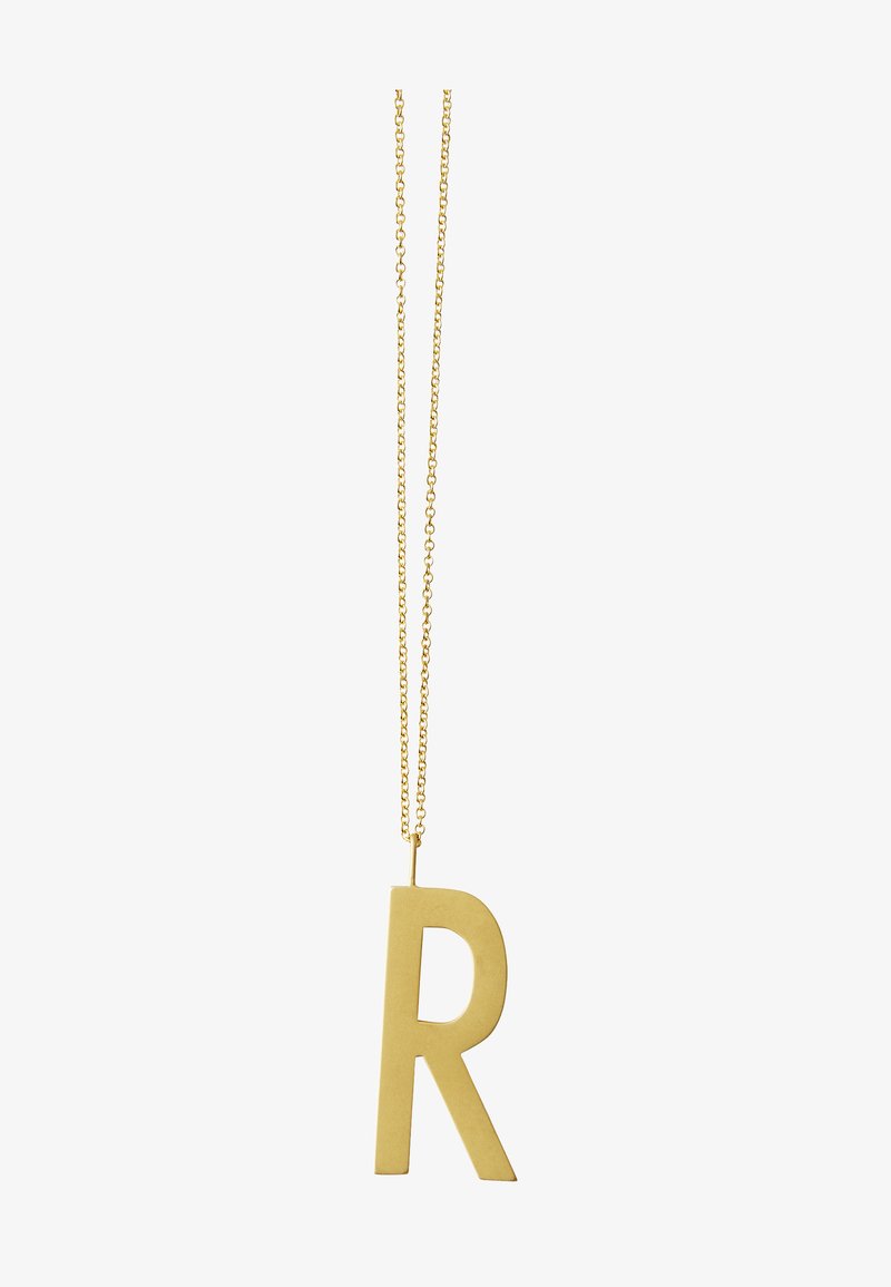 Pendentif en or en forme de grande lettre "R" majuscule, avec une finition lisse et mate, suspendu à une chaîne délicate.
