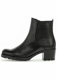 Botte noire en cuir à cheville avec un bout rond, des panneaux latéraux élastiques et un talon bloc épais. Semelle texturée pour une adhérence accrue.