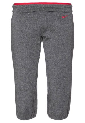 Pantalon de survêtement court gris Nike avec poignets élastiques et doublure de ceinture rouge, présentant un petit logo Nike rouge sur la hanche droite.