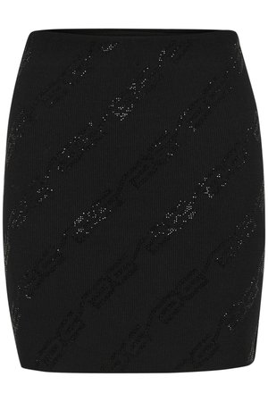 Black knitted mini skirt featuring a textured pattern with shiny accents. Designed with a fitted silhouette and a smooth waistband.