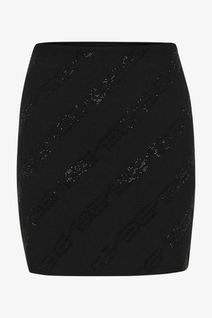 Mini-jupe tricotée noire avec un motif texturé et des accents brillants. Conçue avec une silhouette ajustée et une taille lisse.