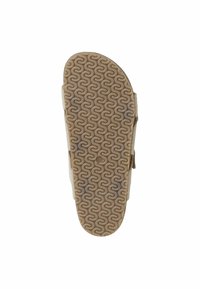 Semelle de sandale avec un motif texturé ondulé, en caoutchouc, de couleur beige. Dispose de deux sangles ajustables pour un bon maintien et soutien.