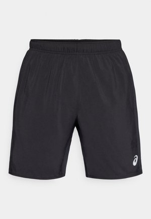 Black athletic shorts with an elastic waistband. Smooth texture and a logo on the lower right front. Knee-length design.