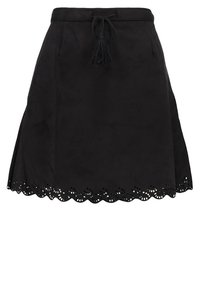 Svart mocka kjol med en utsvängd design, scalloped nederkant och dekorativa utskärningar. Har en dragsko i midjan med en tofsdekor.