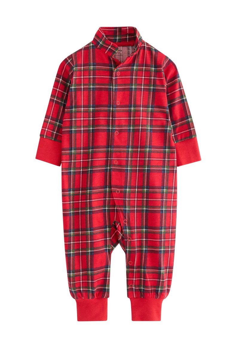 Tuta da pigiama a scacchi rossi con colletto alla cinese, maniche lunghe e bottoni a pressione sul davanti. Polsini e dettagli in rosso unito.
