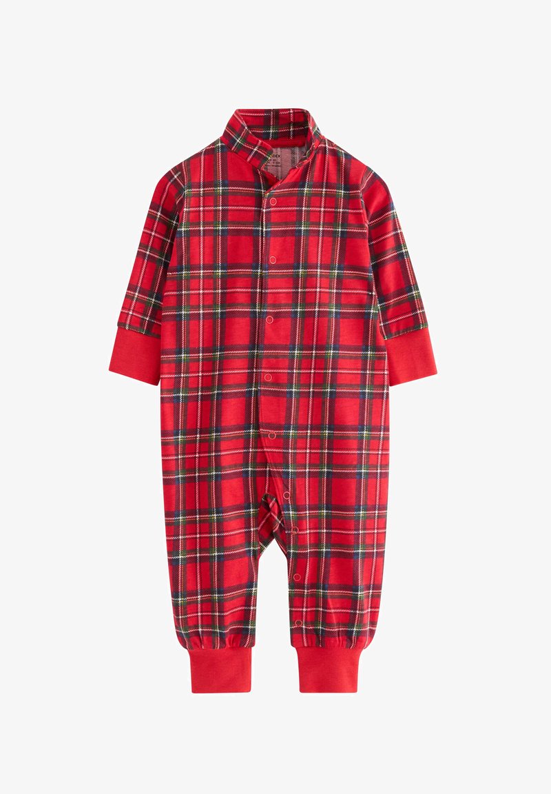 Tuta da pigiama a scacchi rossi con colletto alla cinese, maniche lunghe e bottoni a pressione sul davanti. Polsini e dettagli in rosso unito.