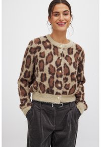 Adīta jaka - leopard