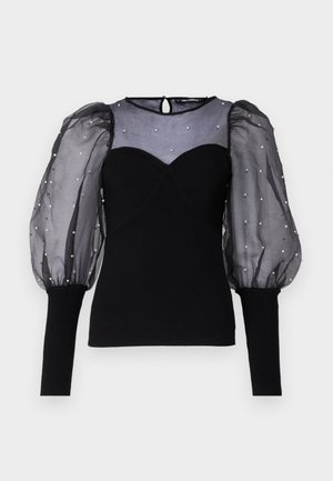 Črna bluzica z prosojnimi napihnjenimi rokavi s bisernimi okraski, srčastim izrezom in prilegnjenim zgornjim delom s rebrasto teksturo.