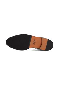 Semelle en caoutchouc noire avec une semelle intérieure en cuir marron, logo embossé et finition texturée. Présente un léger talon pour plus de stabilité.