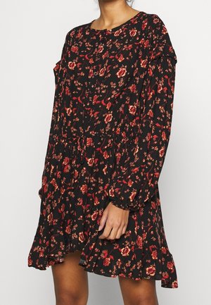 Schwarzes Blumenkleid mit lockerer Passform, langen Ärmeln, Knopfverschluss und gerafftem Taillenbereich. Mit roten und orangefarbenen Blumenmustern.