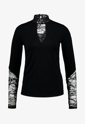 Sort langærmet bluse med høj blondeskrave og blonder på ærmerne, samt udskæringsdetalje ved halsudskæringen. Glat tekstur.