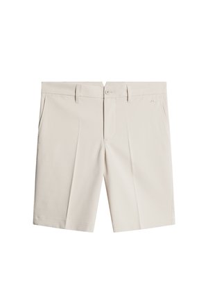 Beige shorts made of lightweight fabric, featuring a flat front, two side pockets, and a button closure. Smooth texture and tailored fit.