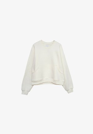 Kremowa bluza z długim rękawem, okrągłym dekoltem, przednią kieszenią kangurka oraz ściągaczami na rękawach i u dołu.