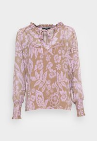 Blusa floreale con base marrone e motivi di foglie e fiori rosa. Presenta una scollatura arricciata e polsini elasticizzati. Tessuto leggero.