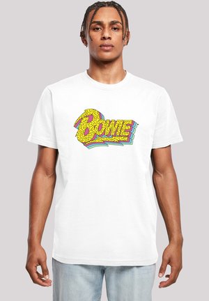 White cotton t-shirt featuring a colorful "Bowie" graphic in yellow with black spots and layered pastel accents, short sleeves, and a crew neck.