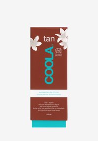 Braune Verpackung mit weißen Blumen, blauer Logotext und einem türkisfarbenen Akzent am Boden. Etiketten weisen auf "sonnenfreies Bräunungsölnebel" hin, 100 ml.