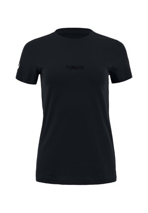 Camiseta negra de manga corta con "Türkiye" en negro en el pecho y un pequeño logo blanco de Nike en la manga izquierda, mostrada sobre un fondo liso.