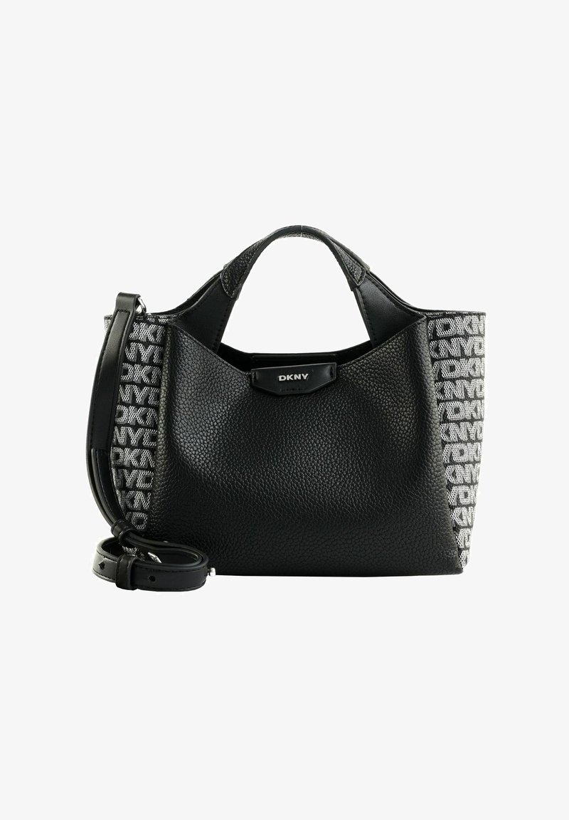 Sac à main DKNY en cuir noir texturé avec poignées courtes, bandoulière réglable et panneaux latéraux blancs au motif du logo.