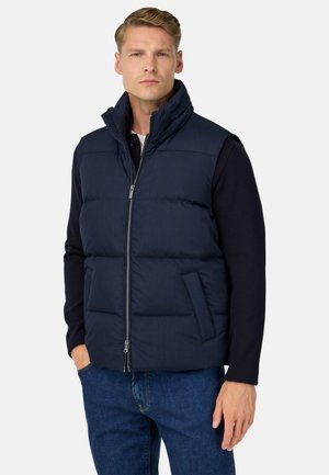 Marineblau gesteppte Weste mit hohem Kragen, Frontreißverschluss und zwei seitlichen Taschen, aus einem glatten, leichten Material gefertigt.