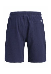 Shorts bleu marine texturés avec une taille élastique et une poche arrière. Présente un motif en relief subtil sur le tissu. Matériau léger.