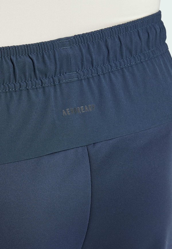 DESIGNED FOR HYBRID - Tracksuit bottoms - aurora ink2