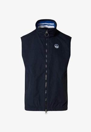 Gilet sans manches bleu marine avec fermeture éclair complète à l'avant, col montant doublé de rayures blanches et bleues, et petit logo rond sur la poitrine.