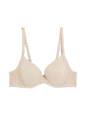 Light beige bra with molded cups and lace detailing on the sides. Adjustable straps and a seamless finish enhance comfort and support.