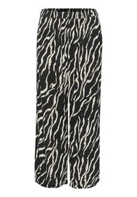 Black and white zebra print wide-leg pants with a smooth texture, elastic waistband, and two side pockets. Relaxed fit, lightweight fabric.