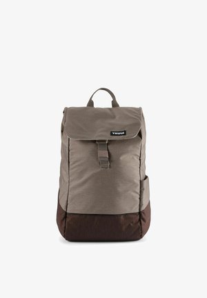 Brown and dark brown Thule backpack with a top flap and front buckle closure, and a fabric handle on top.