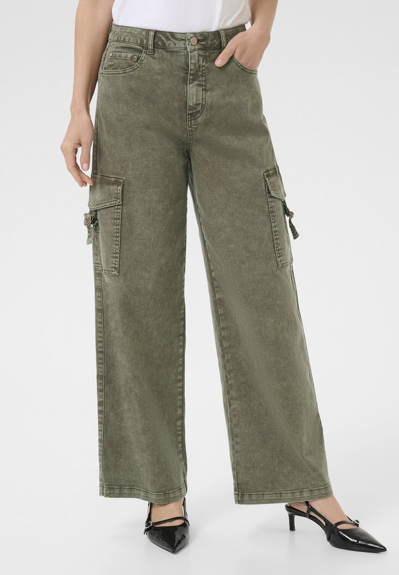 Cream Kavbojke na trapez - heavy washed green