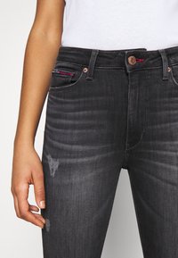 Tommy Jeans Jeans Skinny Fit - black denim