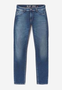 Joggers jeans azul slim-fit hechos de denim. Cuenta con cinco bolsillos, cierre con cremallera y un desgaste sutil en las piernas. Textura suave y cinturilla estándar.