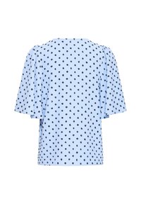 Chemisier bleu clair à pois noirs, manches courtes larges et dos droit, présenté sur un fond blanc.