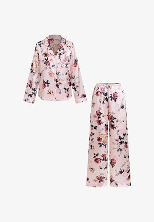 Roze satijnen bloemenpyjama met een blouse met lange mouwen en knopen en wijde broek met elastische taille.