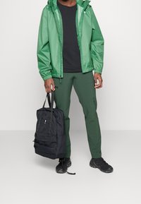 The North Face Vodotěsná bunda - dark green