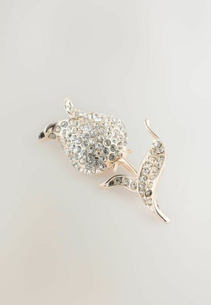 Silberne Brosche in Form einer Blume, besetzt mit klaren Strasssteinen. Verfügt über detailreiche Blütenblätter und Blätter mit glatter Oberfläche.