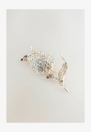 Silberne Brosche in Form einer Blume, besetzt mit klaren Strasssteinen. Verfügt über detailreiche Blütenblätter und Blätter mit glatter Oberfläche.