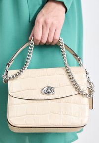 EMBOSSED CASSIE CROSSBODY - Käsilaukku - ivory