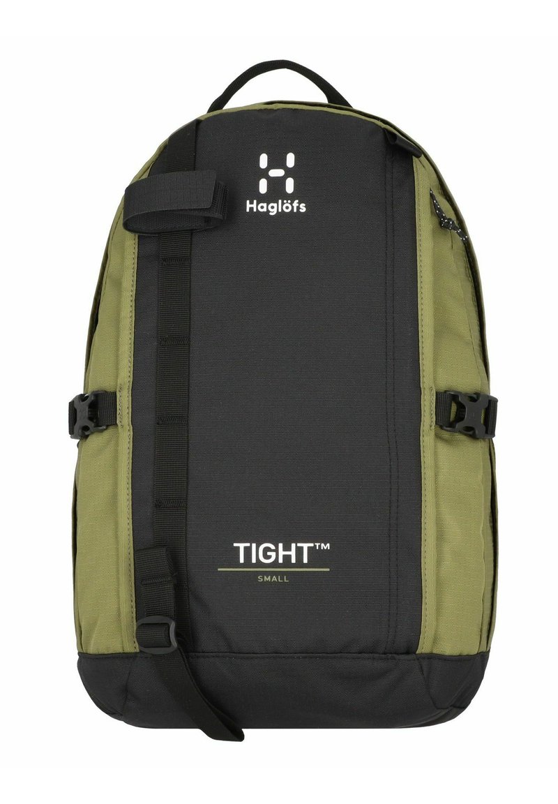 Zaino nero e verde con logo, caratterizzato da un design robusto, cinghie laterali e una fibbia frontale. Il testo recita "TIGHT™ SMALL". Tessuto testurizzato.