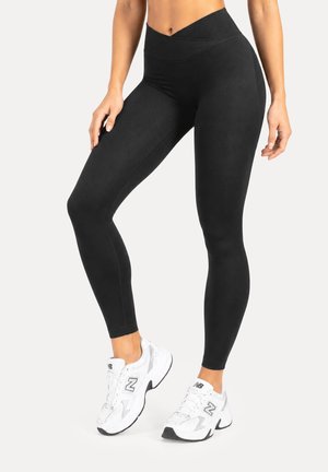 Smilodox, SILVIA BODY BOOST SCRUNCH LEGGINGS - Leggings - schwarz