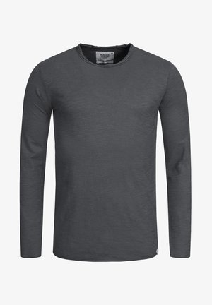 Mörkgrå långärmad T-shirt gjord av mjukt tyg, med rund halsringning och en subtilt texturerad yta. En liten logotag vid fållen.