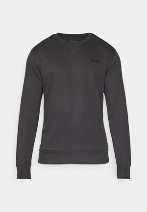 Dark gray sweatshirt with a v-neck, long sleeves, ribbed cuffs, and hem. Features a small black logo on the chest. Smooth texture.
