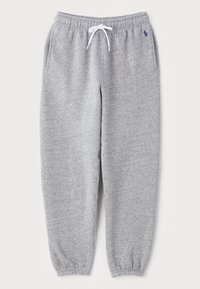 Grå mjukisbyxor av mjukt tyg, med elastisk midja, vit snörning och avslut i anklarna. Litet logo på vänster lår.
