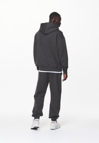 Pegador LOGO JOGGER - Træningsbukser - washed volcano grey