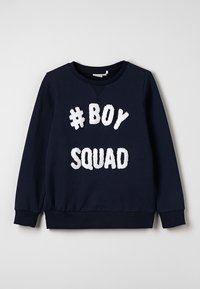 Felpa blu navy realizzata in tessuto morbido, con lettering bianco testurizzato che recita "#BOY SQUAD" sulla parte anteriore e polsini a costine.